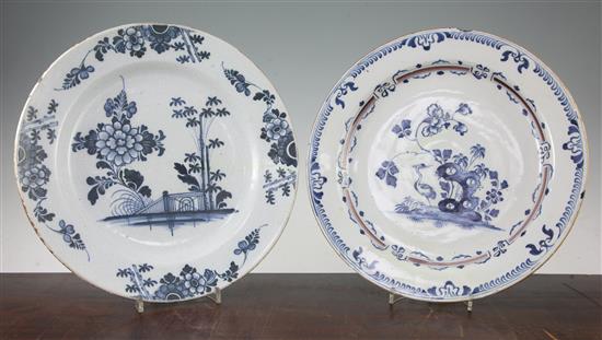 Two Delft blue and white chargers, 18th century, 35cm, both restored